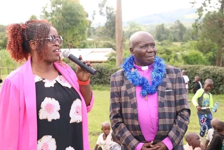 Pastor Pam and Bishop William K. Tuimising addressing a community gathering